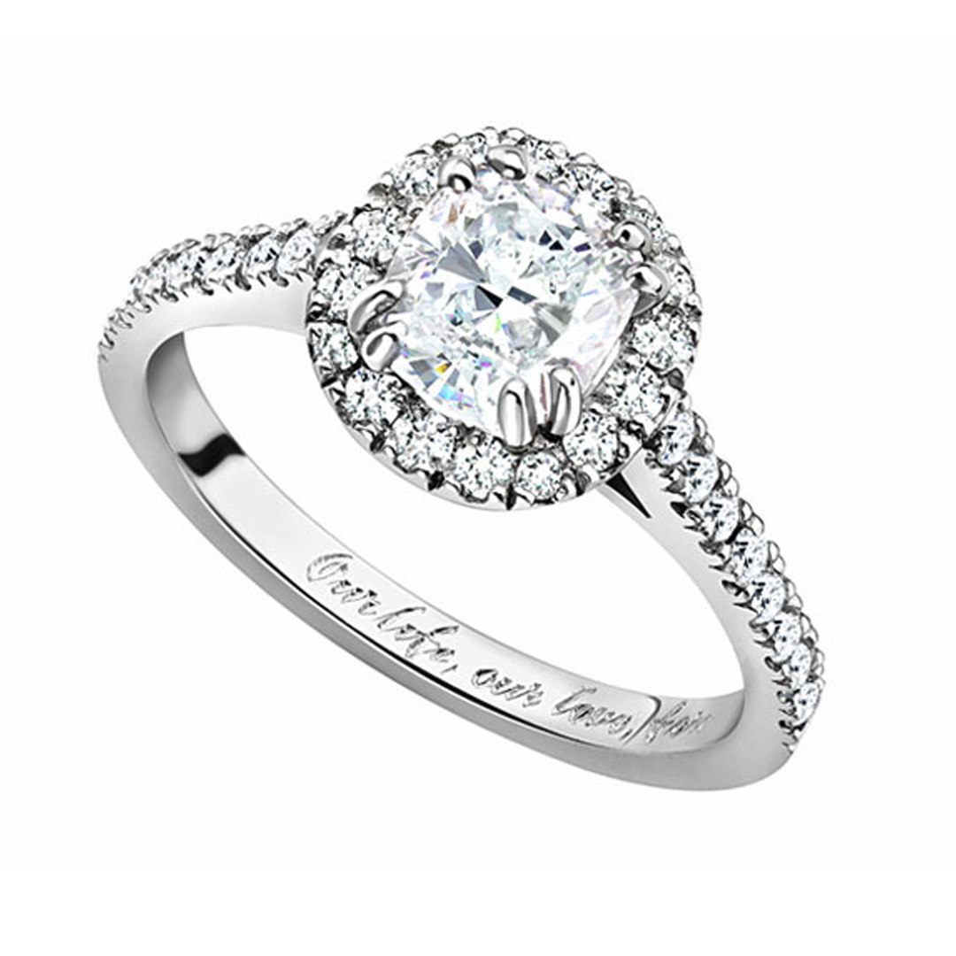 Bespoke Platinum Cluster set with a Cushion Cut GIA Certified Diamond